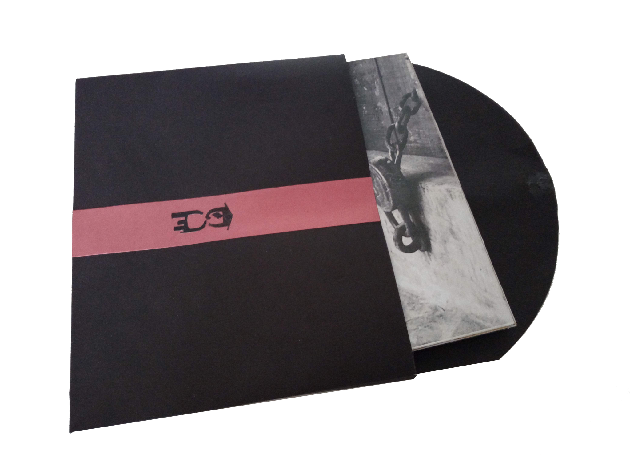 Book in a black slipcase with a pink band and a disc